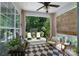 Cozy patio with outdoor seating and views of the landscaped backyard at 8637 Annabel Lee Ln, Charlotte, NC 28277