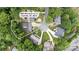 Aerial view of a home on a cul-de-sac surrounded by mature trees at 9605 Mountain Ivy Ct, Charlotte, NC 28210
