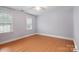 Bedroom featuring hardwood floors and natural light from the windows at 9605 Mountain Ivy Ct, Charlotte, NC 28210