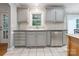 Kitchen features gray cabinets, stainless steel appliances, and a stainless steel dishwasher at 9605 Mountain Ivy Ct, Charlotte, NC 28210