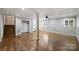 Finished basement boasts hardwood floors, support columns, and a staircase to the main level at 1008 Dumbarton Rd, Gastonia, NC 28054