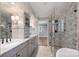 Bathroom boasts double vanity and glass enclosed shower at 1008 Dumbarton Rd, Gastonia, NC 28054