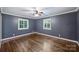 Bedroom features hardwood floors and plantation shutters at 1008 Dumbarton Rd, Gastonia, NC 28054