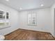 Bright bedroom with plantation shutters, hardwood floors, and recessed lighting at 1008 Dumbarton Rd, Gastonia, NC 28054