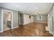 Living room offers hardwood floors and ample closet space at 1008 Dumbarton Rd, Gastonia, NC 28054