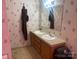 Bathroom featuring double sinks and vanity with framed mirror at 1064 Calico Farm Ct, Cleveland, NC 27013