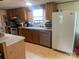 Functional kitchen design featuring modern appliances, wood cabinets, and ample counter space at 1064 Calico Farm Ct, Cleveland, NC 27013
