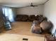 View of the spacious living room featuring a large seating area and ceiling fan at 1064 Calico Farm Ct, Cleveland, NC 27013