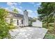 Backyard patio area with a partial fence and home exterior at 11411 Ridge Oak Dr, Charlotte, NC 28273