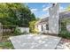 Concrete patio area with a partial fence and home exterior at 11411 Ridge Oak Dr, Charlotte, NC 28273