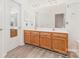 Bathroom featuring double sinks and a large mirror at 11411 Ridge Oak Dr, Charlotte, NC 28273
