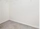 Empty walk-in closet with built-in shelving at 11411 Ridge Oak Dr, Charlotte, NC 28273