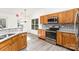 Updated kitchen featuring stainless steel appliances and light wood cabinets at 11411 Ridge Oak Dr, Charlotte, NC 28273