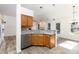 Kitchen with stainless steel appliances, granite countertops and light wood cabinets at 11411 Ridge Oak Dr, Charlotte, NC 28273