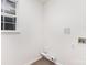 Empty laundry room with hookups ready for appliances at 11411 Ridge Oak Dr, Charlotte, NC 28273