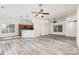 Bright, open floor plan connecting the living room and kitchen, showcasing the modern floors at 11411 Ridge Oak Dr, Charlotte, NC 28273
