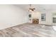 Spacious living room featuring a brick fireplace, modern floors, and ample natural light at 11411 Ridge Oak Dr, Charlotte, NC 28273