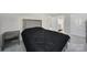 Simple bedroom with a padded headboard and a nightstand at 1169 Hollis Sw Cir, Concord, NC 28025