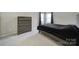 Neutral bedroom with carpet and a bed with wood trim at 1169 Hollis Sw Cir, Concord, NC 28025