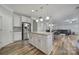 Well-equipped kitchen with stainless steel appliances, island and ample counter space at 1169 Hollis Sw Cir, Concord, NC 28025