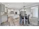 Modern kitchen featuring stainless steel appliances and ample counter space for meal preparation at 1169 Hollis Sw Cir, Concord, NC 28025