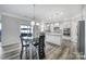 Well-equipped kitchen with stainless steel appliances, island, and ample counter space at 1169 Hollis Sw Cir, Concord, NC 28025