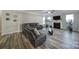 Spacious living room features a cozy fireplace and views of the open-concept floor plan at 1169 Hollis Sw Cir, Concord, NC 28025