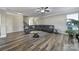 Spacious living room featuring stylish furniture and a ceiling fan for added comfort at 1169 Hollis Sw Cir, Concord, NC 28025