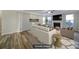 Staged living room with neutral palette with cozy fireplace and comfortable furniture at 1169 Hollis Sw Cir, Concord, NC 28025