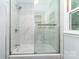 The bathroom features a shower with glass doors and white tile at 133 Pecan Ln, Salisbury, NC 28146
