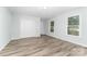 Bedroom with a window and closet has wood flooring at 133 Pecan Ln, Salisbury, NC 28146
