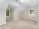 Bright bedroom featuring neutral walls, carpeted floors, and windows that provide natural light at 133 Pecan Ln, Salisbury, NC 28146