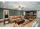 Spacious basement area with a billiards table, seating, and a kitchenette for entertaining at 146 Bullfinch Rd, Mooresville, NC 28117