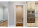 Gourmet kitchen features stainless appliances and access to lower level stairs at 146 Bullfinch Rd, Mooresville, NC 28117