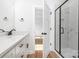 Modern bathroom with a sleek glass shower enclosure, quartz countertops, and updated black fixtures at 150 Autumn Blaze Rd, China Grove, NC 28023