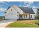 Charming single-Gathering home featuring a two-car garage and classic architectural style at 150 Autumn Blaze Rd, China Grove, NC 28023