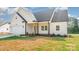 Charming single-Gathering home featuring a two-car garage and classic architectural style at 150 Autumn Blaze Rd, China Grove, NC 28023