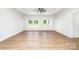 Bright living room with modern ceiling fan, recessed lights, and french doors to backyard at 150 Autumn Blaze Rd, China Grove, NC 28023