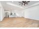 Open floor plan showcasing a spacious living room with a view into the kitchen at 150 Autumn Blaze Rd, China Grove, NC 28023