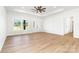 Bright living room with modern ceiling fan, recessed lights, and french doors to backyard at 150 Autumn Blaze Rd, China Grove, NC 28023