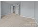 Empty bedroom with neutral carpet and closet at 157 Talbert Town Loop, Mooresville, NC 28117
