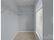 Walk-in closet with wire shelving and window at 157 Talbert Town Loop, Mooresville, NC 28117