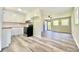 Charming kitchen with white cabinets, butcher block counters, and stainless steel appliances at 1678 Nelson Dr, Newton, NC 28658