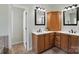 Bright bathroom featuring double vanities, framed mirrors and tile flooring at 170 Saint James Way, Salisbury, NC 28147