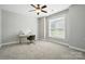 Neutral bedroom with carpet flooring features a ceiling fan and a large window with blinds at 170 Saint James Way, Salisbury, NC 28147