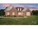 Charming brick home with a manicured lawn and inviting front entrance, perfect for families at 170 Saint James Way, Salisbury, NC 28147