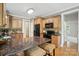 Kitchen area with wooden cabinets, granite counters, stainless steel appliances and breakfast bar at 170 Saint James Way, Salisbury, NC 28147