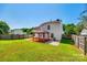 A well-maintained backyard features a charming gazebo on a red deck, perfect for outdoor living and entertaining at 1706 Baylor Dr, Rock Hill, SC 29732