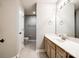 Bright bathroom featuring tile flooring, a spacious vanity, and toilet in separate room at 1706 Baylor Dr, Rock Hill, SC 29732