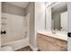 Bathroom features a bathtub-shower combination, single vanity, and tile floor, offering a functional design at 1706 Baylor Dr, Rock Hill, SC 29732